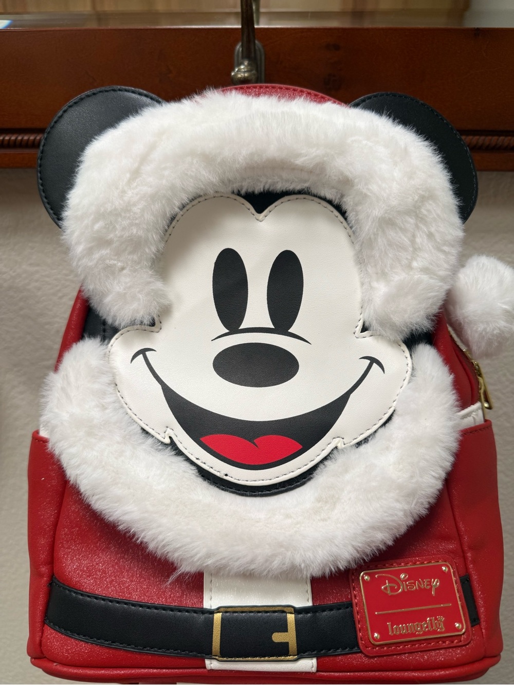 Loungefly Disney Glitter Mickey Mouse Santa Mini Backpack.